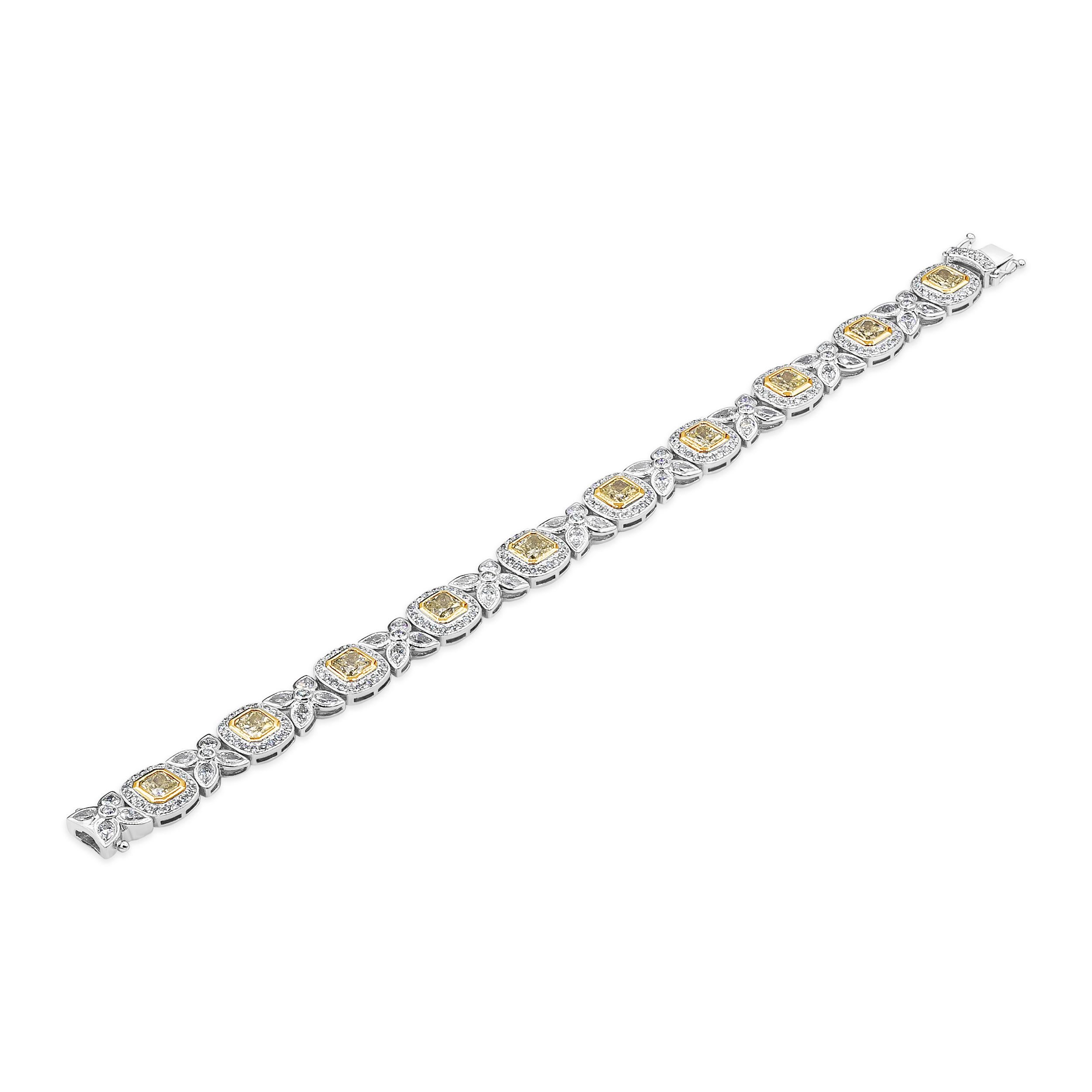 A unique piece of jewelry handcrafted in New York City. Showcasing yellow radiant cut diamonds weighing 5.98 carats total, set in a brilliant diamond halo. Each diamond halo is spaced by marquise cut diamonds arranged in in a beautiful floral motif.
