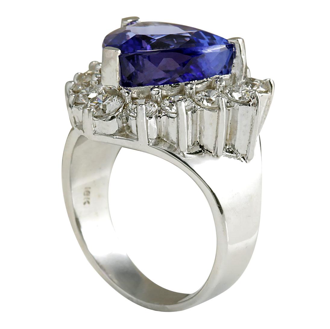 Stamped: 14K White Gold
Total Ring Weight: 12.5 Grams
Total Natural Tanzanite Weight is 9.55 Carat (Measures: 12.50x12.50 mm)
Color: Blue
Total Natural Diamond Weight is 1.66 Carat
Color: F-G, Clarity: VS2-SI1
Face Measures: 20.00x20.00 mm
Sku: