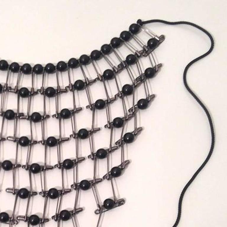 Tamiko Kawata, Lacy Bib Necklace, steel safety pin, wood bead, and cord, 1999 2