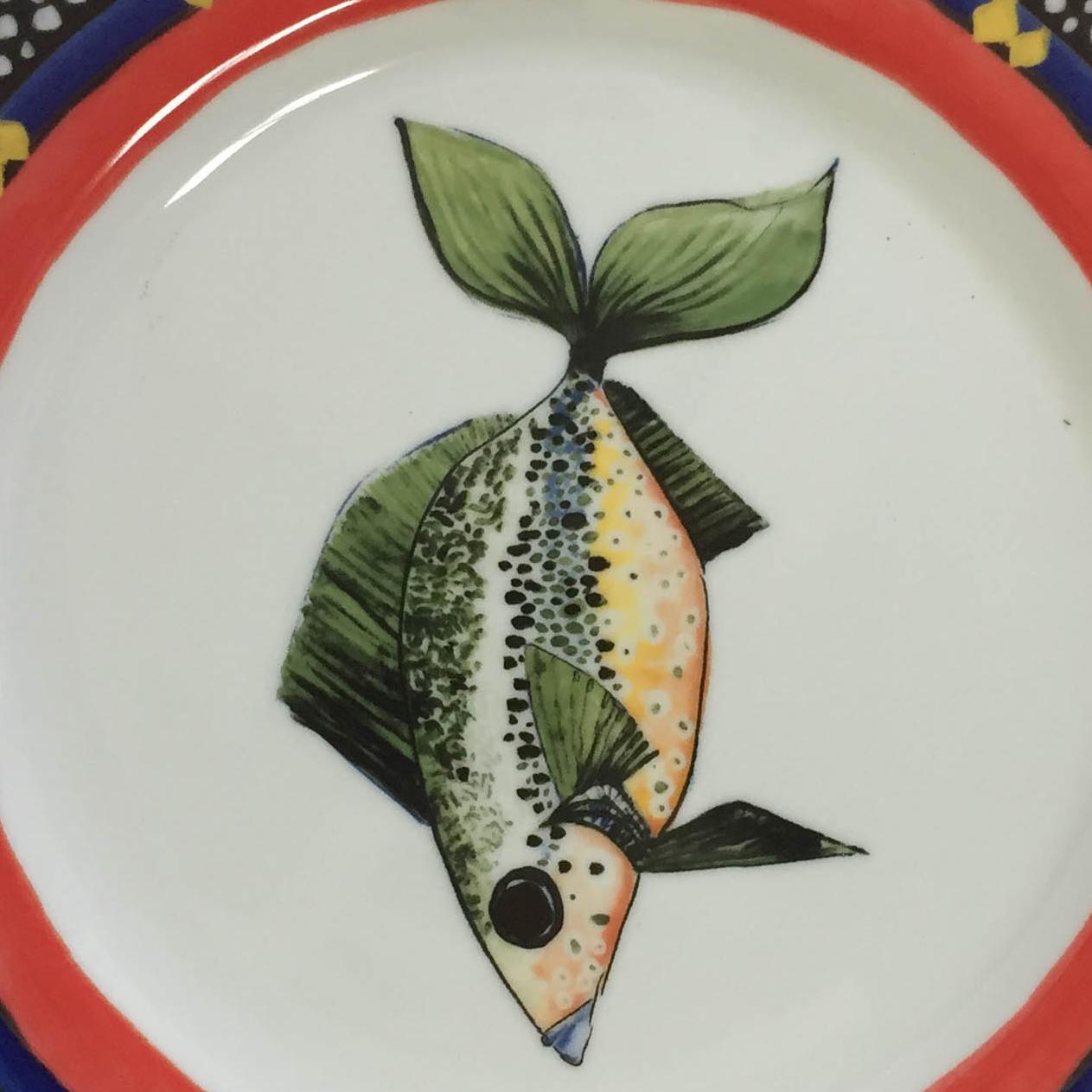 Porcelain plate with fish design by Julie Keyes. Produced by otium. 2016. 10.5