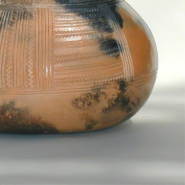 Tangaroa,ceramic vessel paua shell inlay, contemporary Maori artist Wi Taepa

Wi Te Tau Pirika Taepa (born 1946, in Wellington) is a New Zealand ceramicist of Ngāti Pikiao, Te-Roro-o-Te-Rangi, Te Arawa and Te Āti Awa descent. He is recognized as a