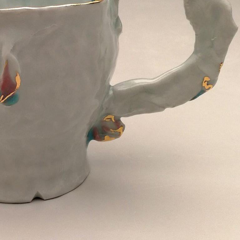 Title : Mapping of Memories - Mug 2
Materials : porcelain, gold
Date : 2017
Dimensions : 4x5.25x4
Description : Hand building, cone10 redux - cone6 redux - cone018 gold