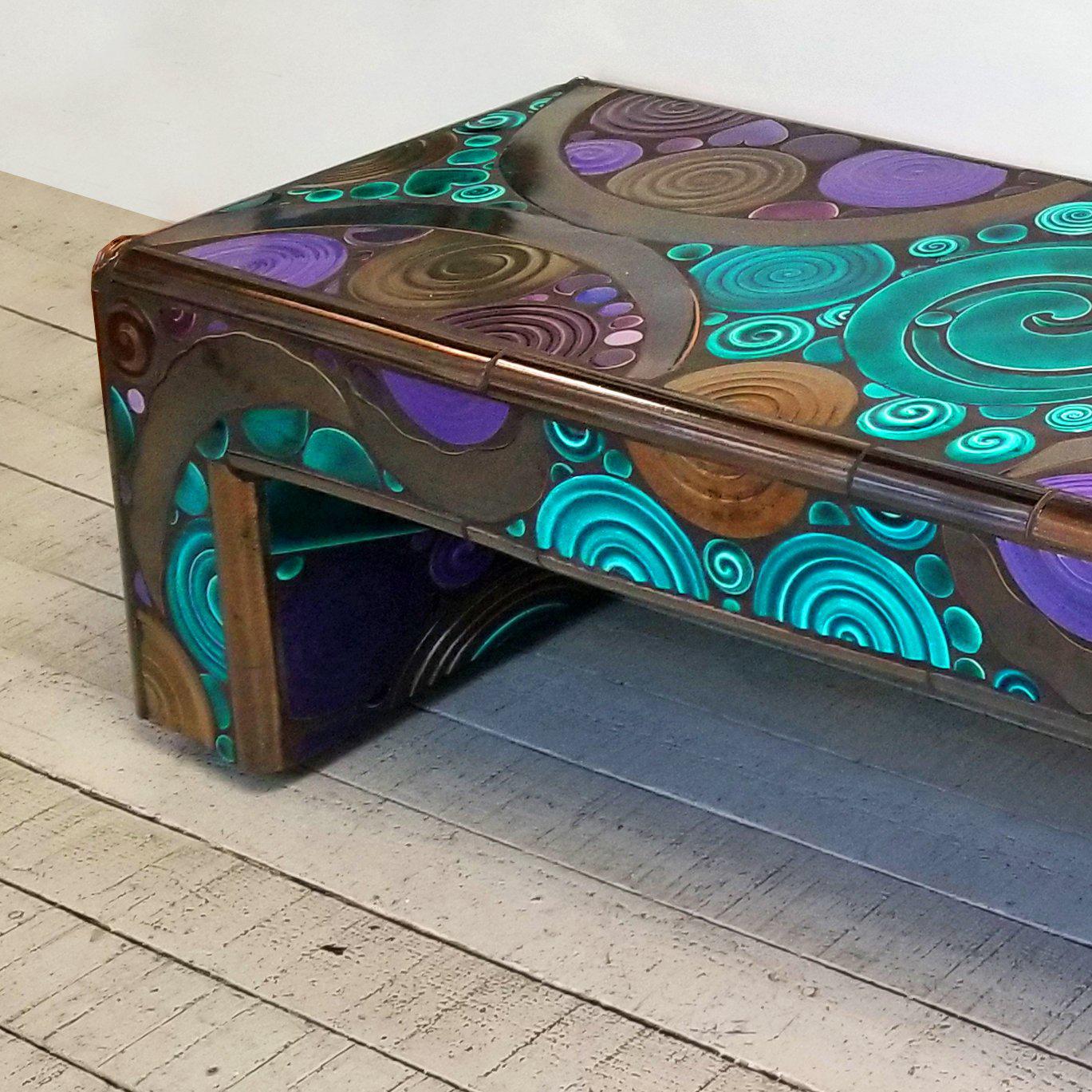 Renowned Laguyna Beach artist Marlo Bartels created this bench using hand-cast ceramic tiles, set in mortar over a frame of steel and structural polycarbonate. Suitable for outdoor use.