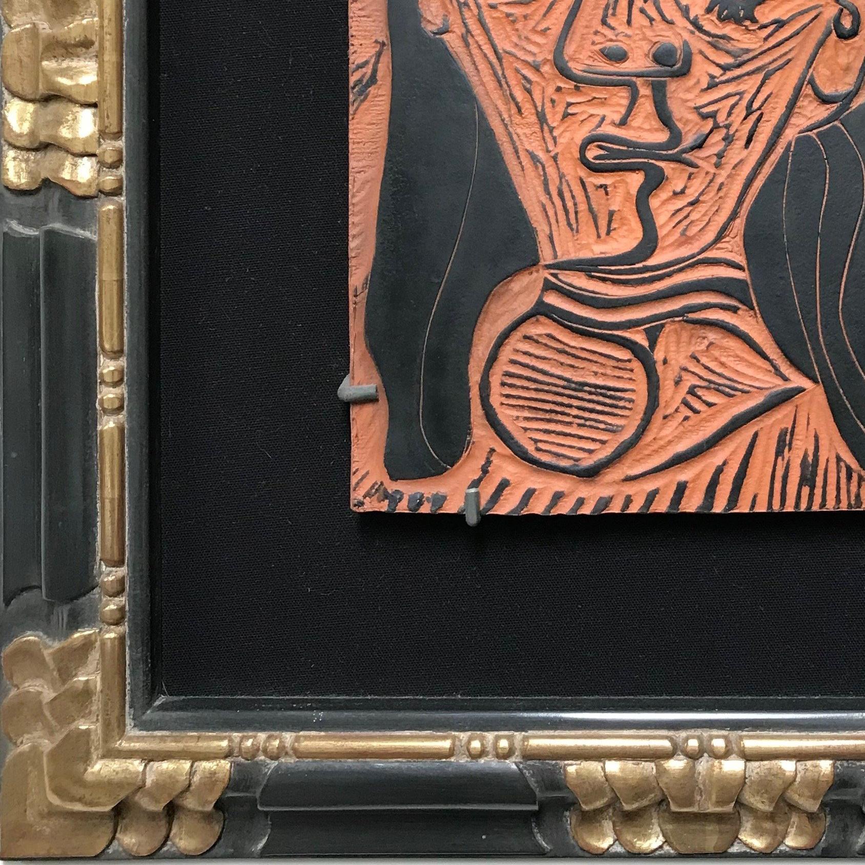 This piece is a rectangular red earthenware clay plaque, printed with engobe pad in black, created by Pablo Picasso in 1964. This piece is numbered from the edition of 100 numbered copies and bears both the Madoura and 