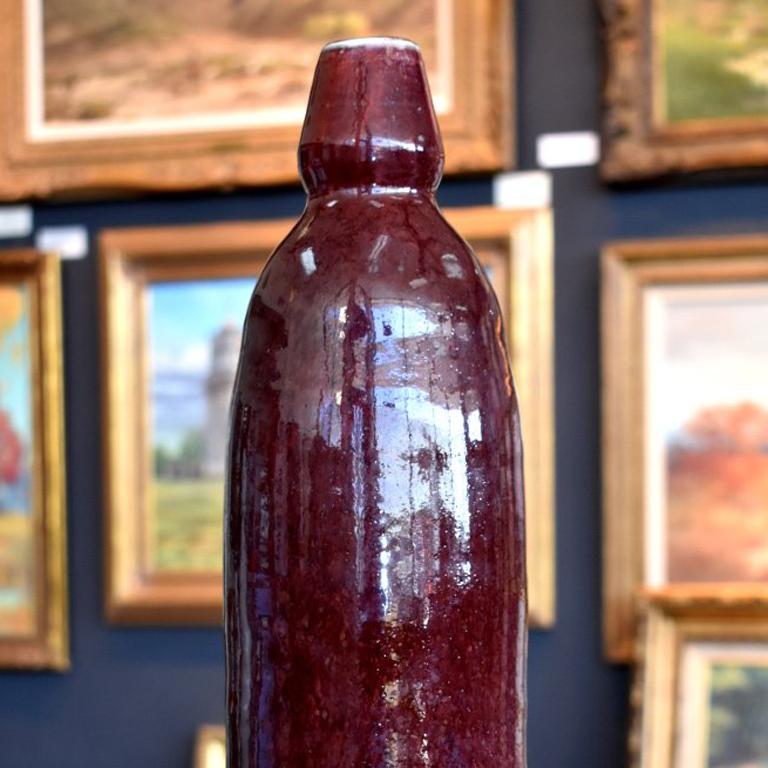 Harding Black
San Antonio (1912 - 2004)
Huge Heavy Oxblood Vase 1984
Height 17''
At widest 5''

Biography 
Harding Black San Antonio (1912 - 2004) 
Harding Black was born on a farm in Nueces County between Ingleside and Aransas Pass and moved with