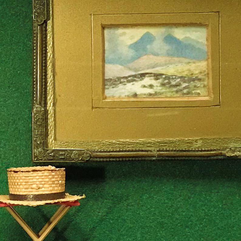 mixed media, with modelled fishing equipment, and a framed riverscape view by Warren Williams, A.R.C.A. (1863-1918), after the picture in the Queen’s Dollhouse (according to a label on the reverse)
7 x 8 ¾ in. (17.8 x 22.2 cm.)
