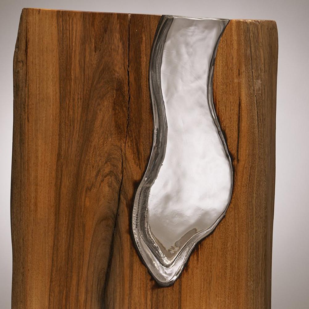 Live Edge Canary Wood with Hand Blown Glass.
The Glass is Blown Directly into the Wood 
This is a Functional Sculpture and can be used for Flowers.
Perfect Accent Piece for any Room.
Designed by Scott Slagerman in collaboration with Jim Fishman
