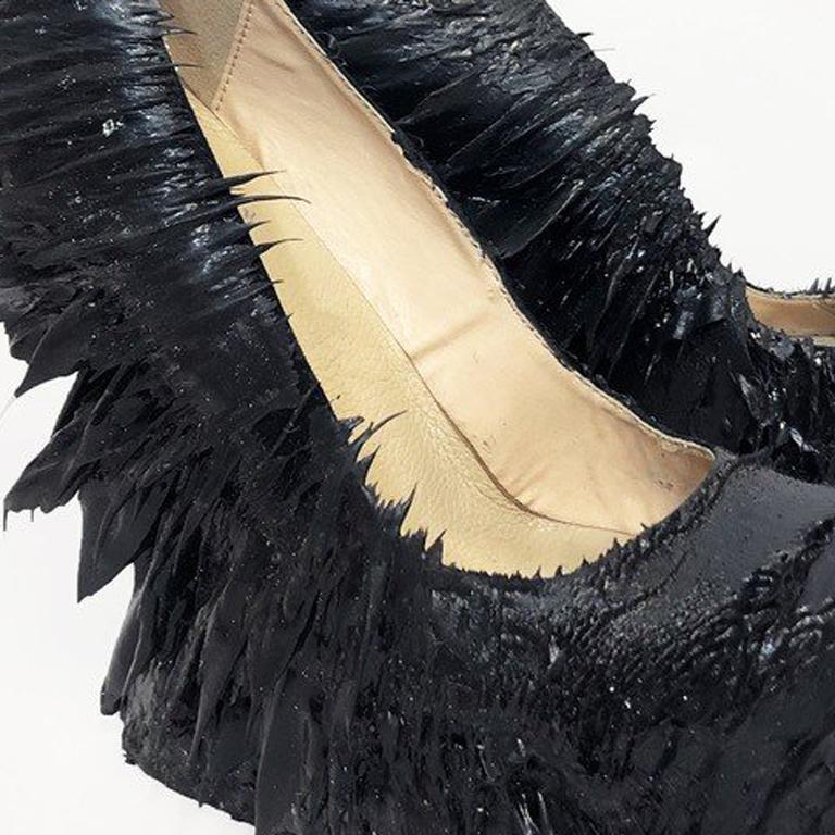 Shoes made in collaboration with artist Jolan van der Wiel for the Magnetic Motion collection. The interplay of magnetic forces inspired the artists to create these shoes, that are ‘grown’ using magnetic fields to create a range where no two shoes