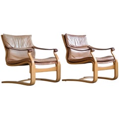 Pair of Danish Ingmar Relling Style Easy Chairs in Tan Leather and Beechwood