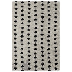 Mursi Hand-Tufted Tencel Rug in Sand with Ink Dot Pattern