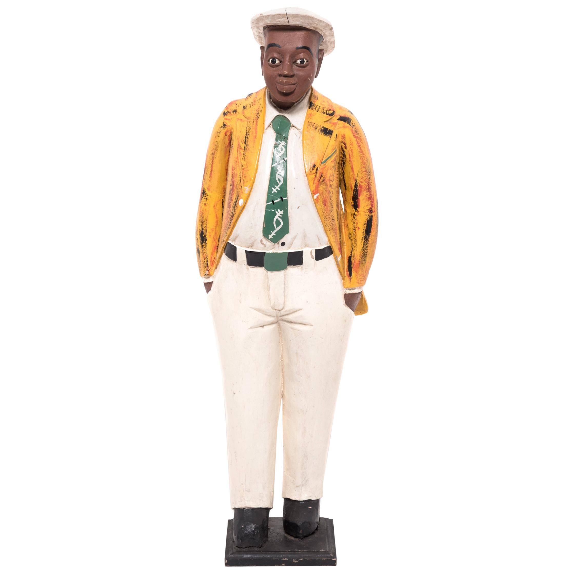 African Colonial Figure with Yellow Jacket