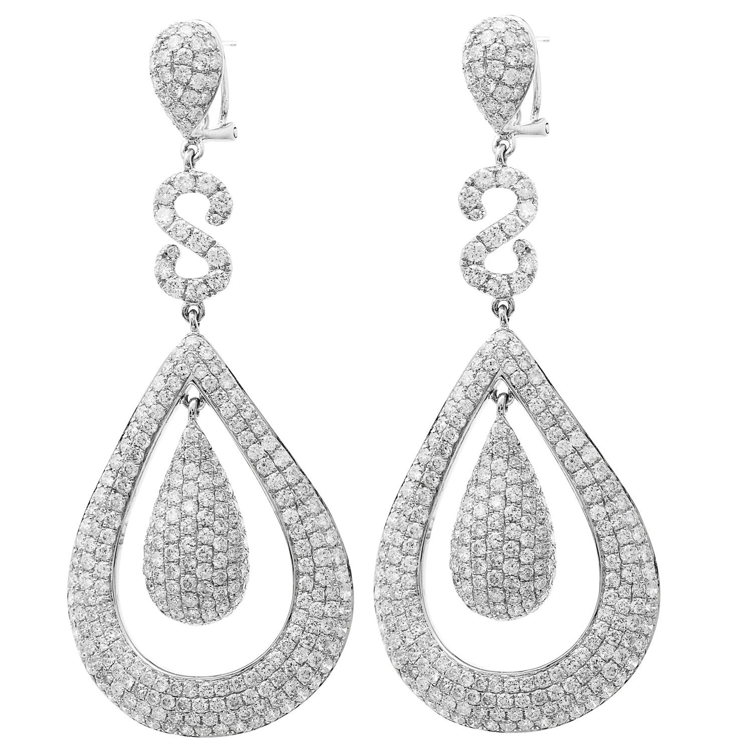 Feel like a Princess! 

Let the sparkle dazzle everyone in the

room and live the true beauty of High-Quality Jewelry!
These Majestic earrings are crafted in 14K White and Yellow Gold. Set with approx. 11.22 carats of round natural diamond, set in