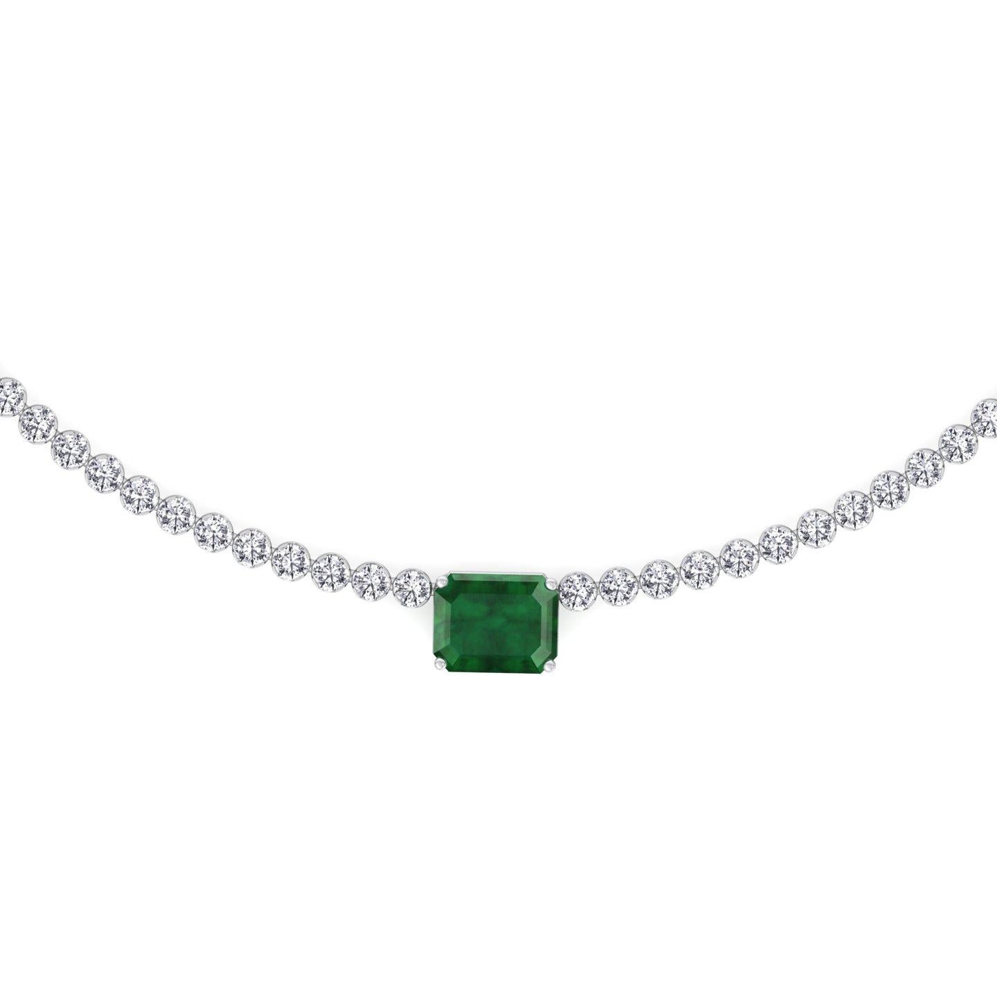 Our Emerald and Diamond Tennis Necklace is an amazing piece. This tennis necklace features a beautiful emerald center stone and to complement the center stone are the dazzling diamonds set in a prong-setting tennis necklace with a total carat weight