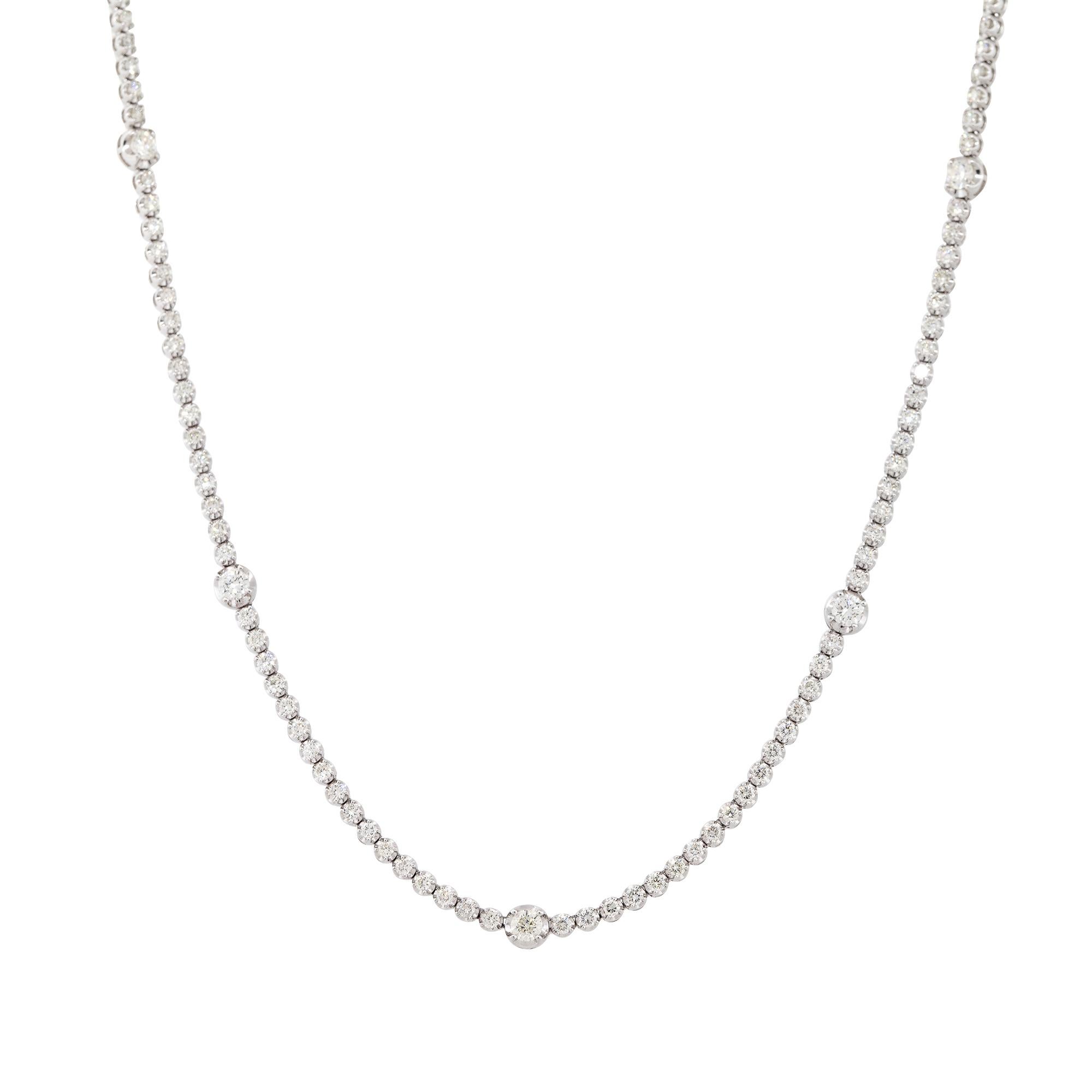 14k Weißgold 11,25ctw Diamant-Tennis-Halskette mit Diamant-Stationen

MATERIAL: 14k Weißgold
Diamant-Details: Ungefähr 11.25ctw runde Brillanten. Entlang der Halskette befinden sich 12 größere Diamantstationen
Gesamtgewicht: 29,08g (18,7dwt) 
Länge