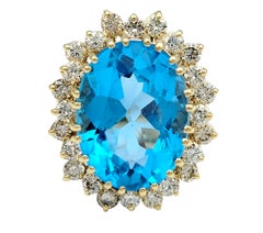 11.25 Carat Oval Cut Blue Topaz with Diamond Halo Cocktail Ring in 14 Karat Gold