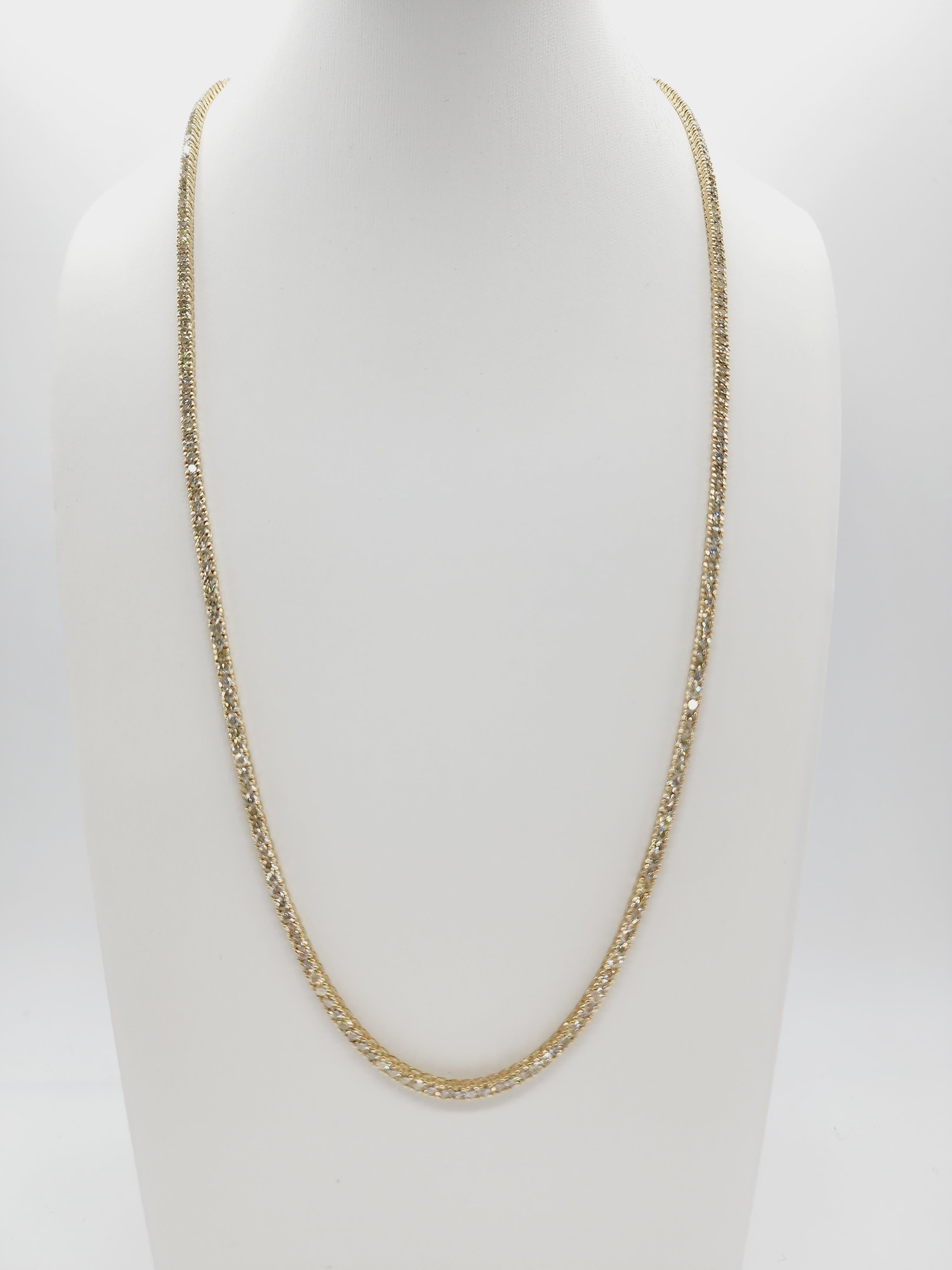 Brilliant and beautiful tennis necklace, natural round-brilliant cut white diamonds clean and Excellent shine. 
14k yellow gold classic four-prong style for maximum light brilliance. 
22 inch length. Average  I Color, SI-I Clarity.