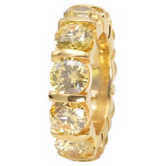 Anello a fascia di eternità con diamante giallo vivo rotondo da 11,25 carati
