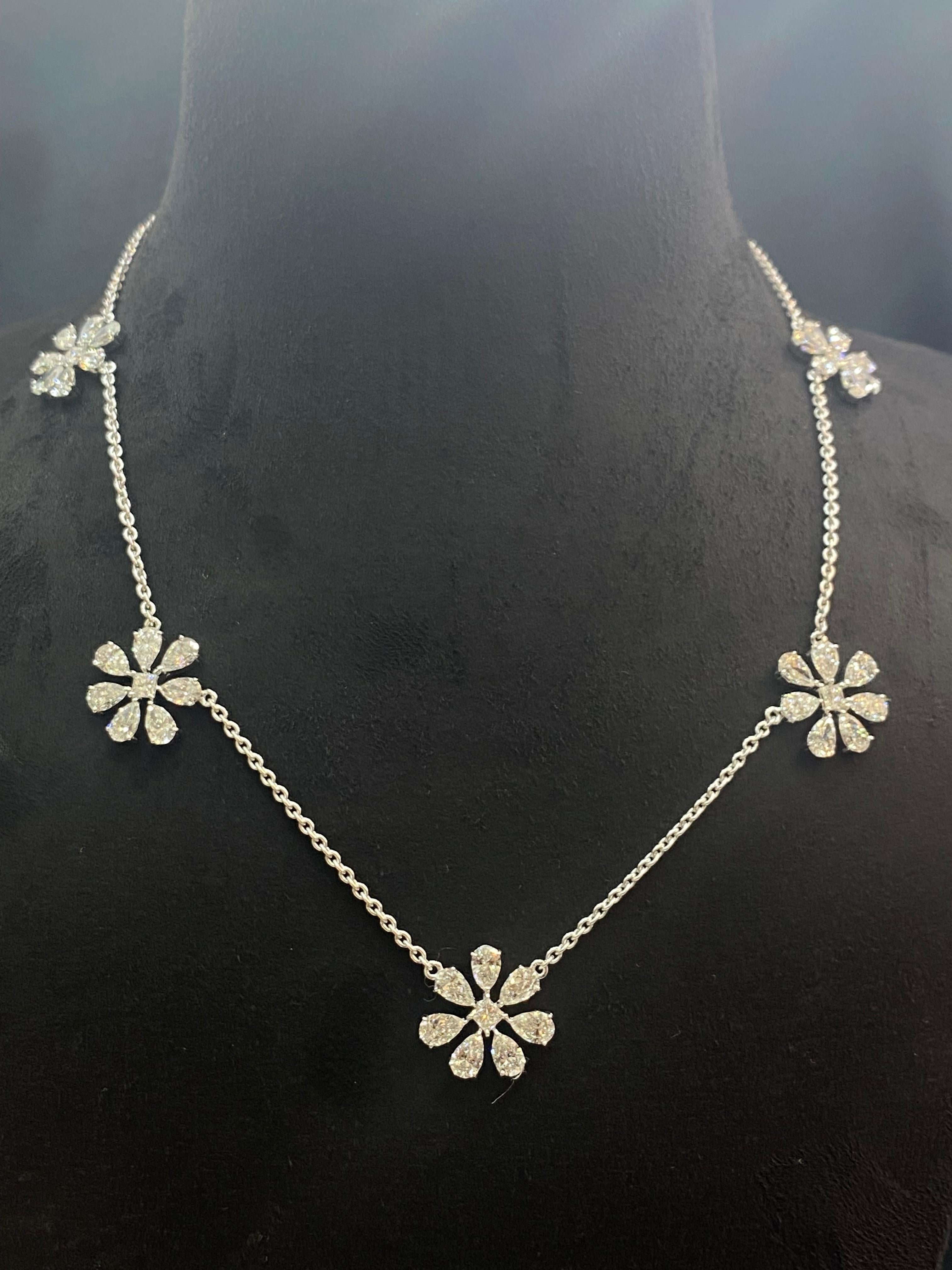 Stand out as the radiant bride you are with this exquisite 11.25 carat Pear Princess diamond floral necklace, designed to add unparalleled brilliance to your special day!

Specifications : 

Diamond Weight : 11.25 Cts [10.50 Cts Pear + 0.75 Cts