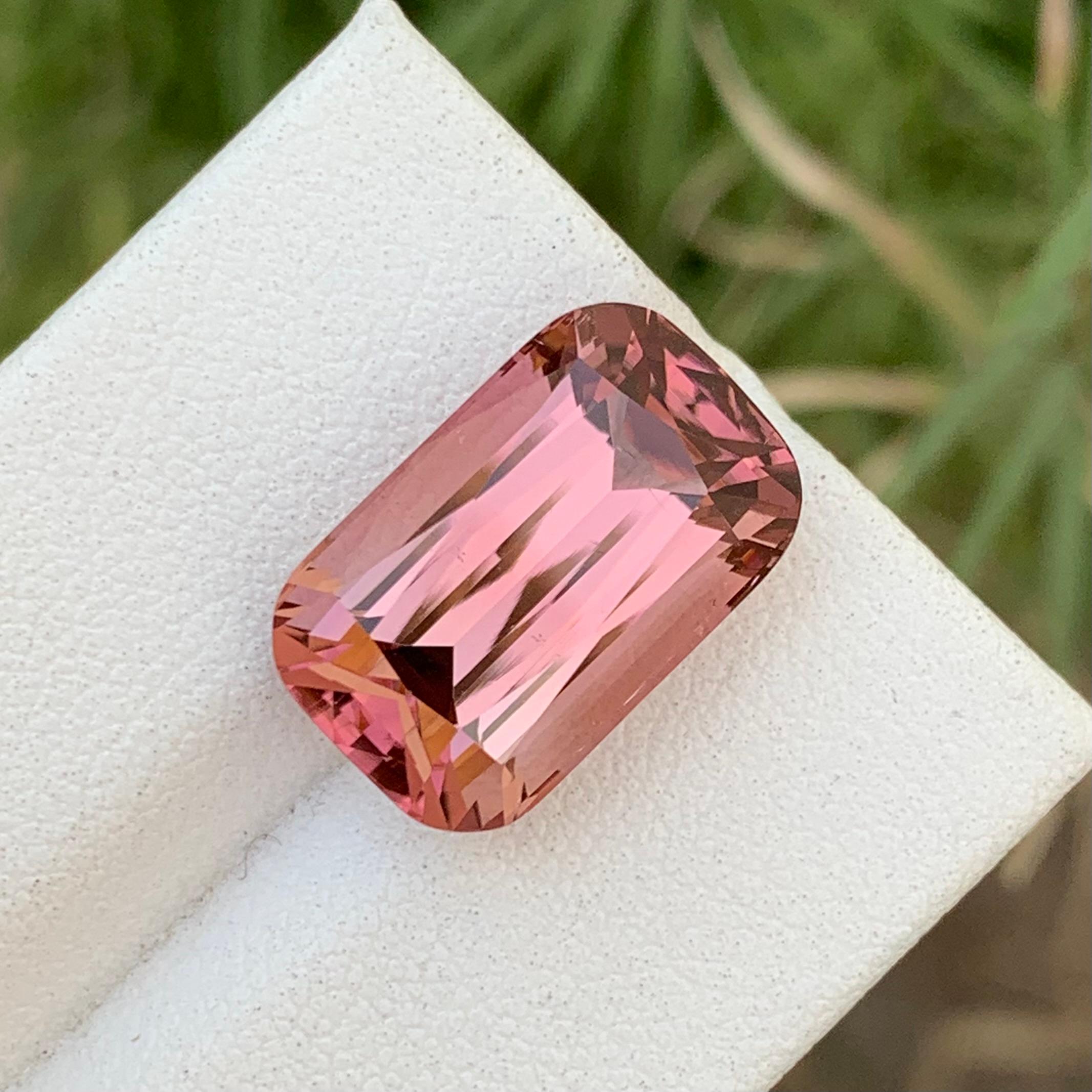 Loose Tourmaline 
Weight: 11.25 Carats 
Dimensions: 16.1x10.1x8.4 Mm 
Origin: Kunar Afghanistan
Shape: Cushion
Colour: Peach Pink
Treatment: Non
Certificate: On Customer Demand 

Peach pink tourmaline, also known as pink rubellite, is a stunning