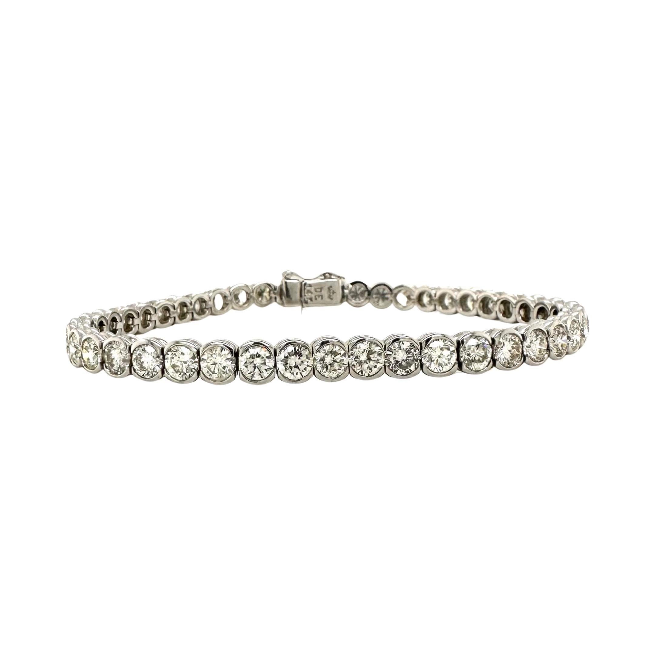 Material	
White Gold
Metal Purity	
18k
Carat Weight	
11.25 ct
Diamond Color	
I-J
Diamond Clarity	
VS1-VS2
Size	
7 inches

The Gorgeous Bezel Set diamond Tennis Bracelet in 18k White Gold is a show stopping piece. The popular setting emerged around