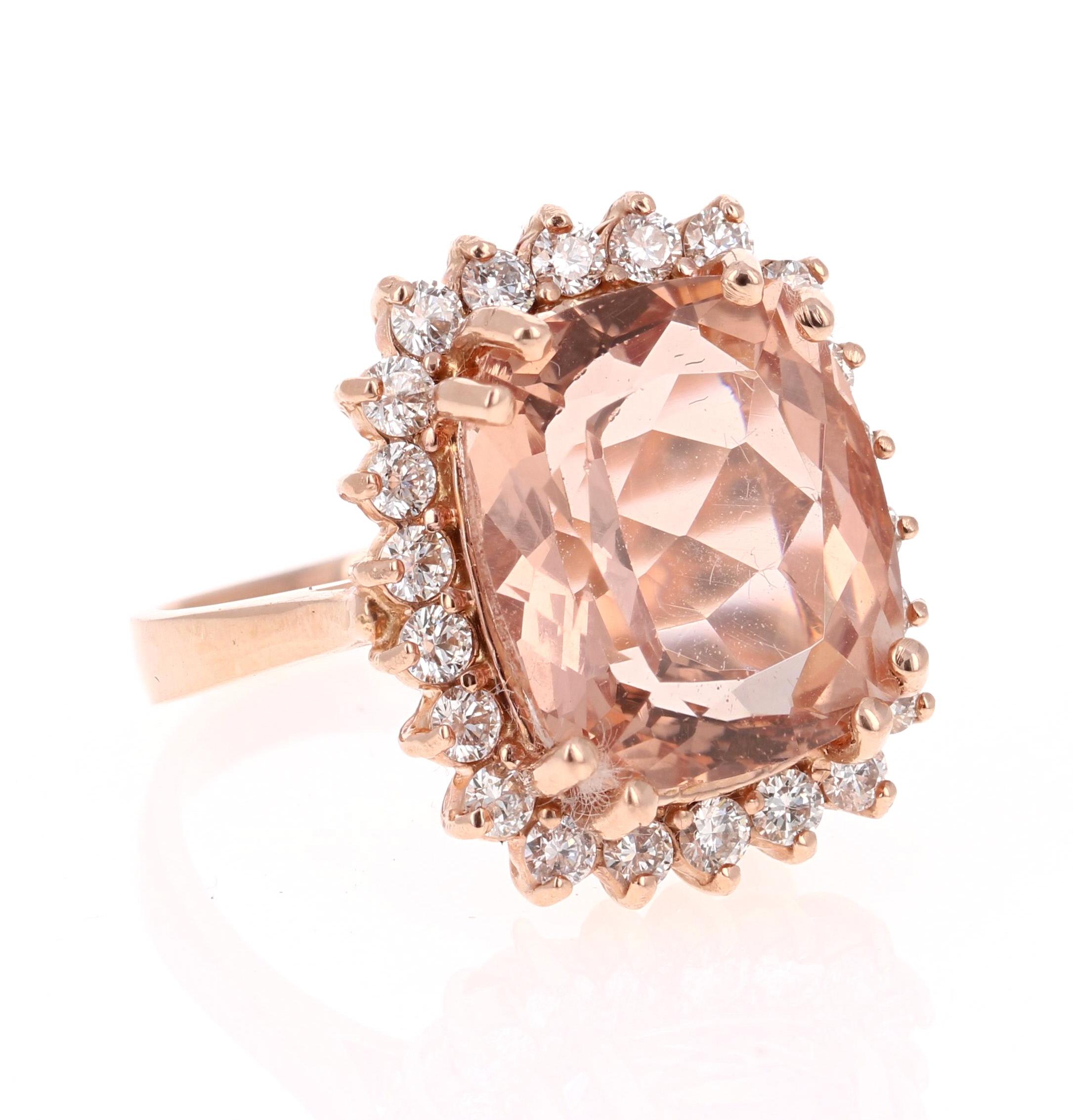 This Morganite ring has a 10.43 Carat Oval-Cushion Cut Morganite and is surrounded by 22 Round Cut Diamonds that weigh 0.84 Carats. Clarity: VS, Color: H. The total carat weight of the ring is 11.27 Carats.  

Crafted in 14 Karat Rose Gold and