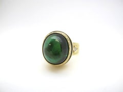 11.28 ct. Green Tourmaline Cabochon, Diamond, Yellow Bezel Dome Band Ring
