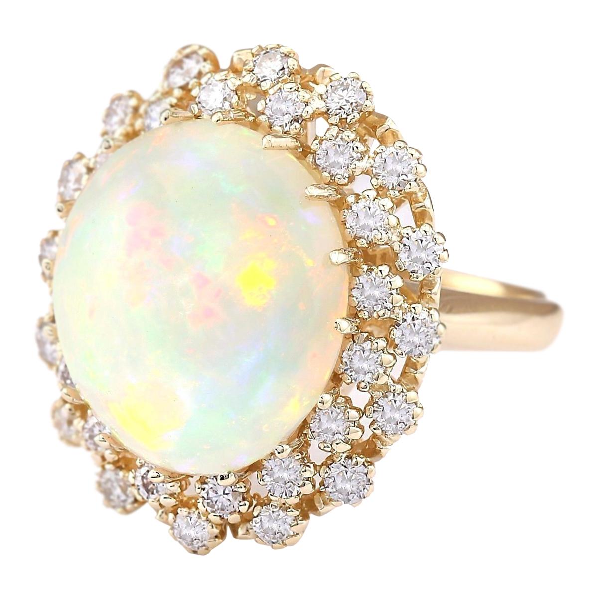Stamped: 14K Yellow Gold
Total Ring Weight: 11.5 Grams
Total Natural Opal Weight is 10.19 Carat (Measures: 16.00x14.00 mm)
Color: Multicolor
Total Natural Diamond Weight is 1.10 Carat
Color: F-G, Clarity: VS2-SI1
Face Measures: 24.40x21.45 mm
Sku: