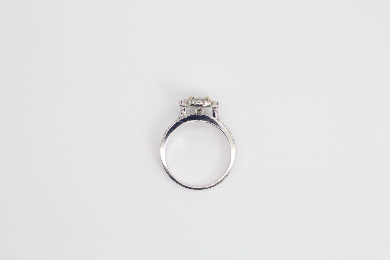 Contemporary 1.12 Carat Diamond Halo Ring