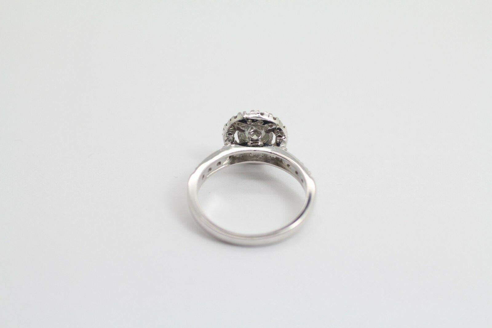 Round Cut 1.12 Carat Diamond Halo Ring