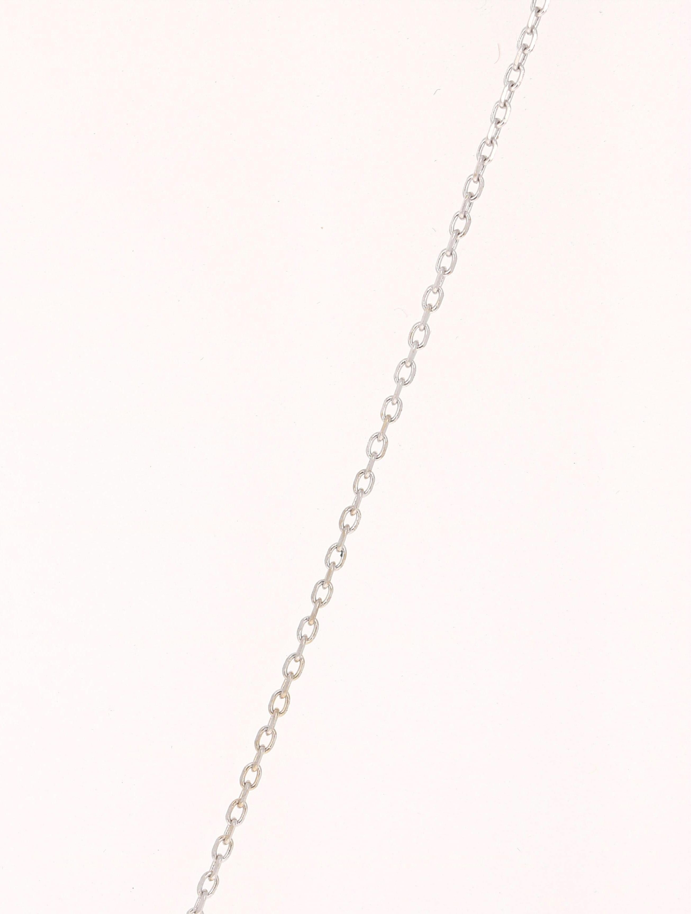 This necklace has 30 Round Cut Black Diamonds that weigh 0.52 Carats and 24 Round Cut Diamonds that weigh 0.61 Carats (Clarity: SI, Color: F).  The total carat weight of the necklace is 1.13 Carats. 

It is beautifully set in 14 Karat White Gold and