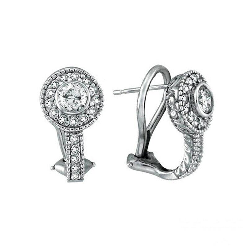 1.13 Carat Natural Diamond Earrings G SI 14K White Gold

100% Natural, Not Enhanced in any way Round Cut Diamond Earrings
1.13CT 
G-H 
SI  
14K White Gold,  4 grams,  Prong and Bezel Style
3/8 inch in width of circle
38 diamonds   (center - 0.33ct