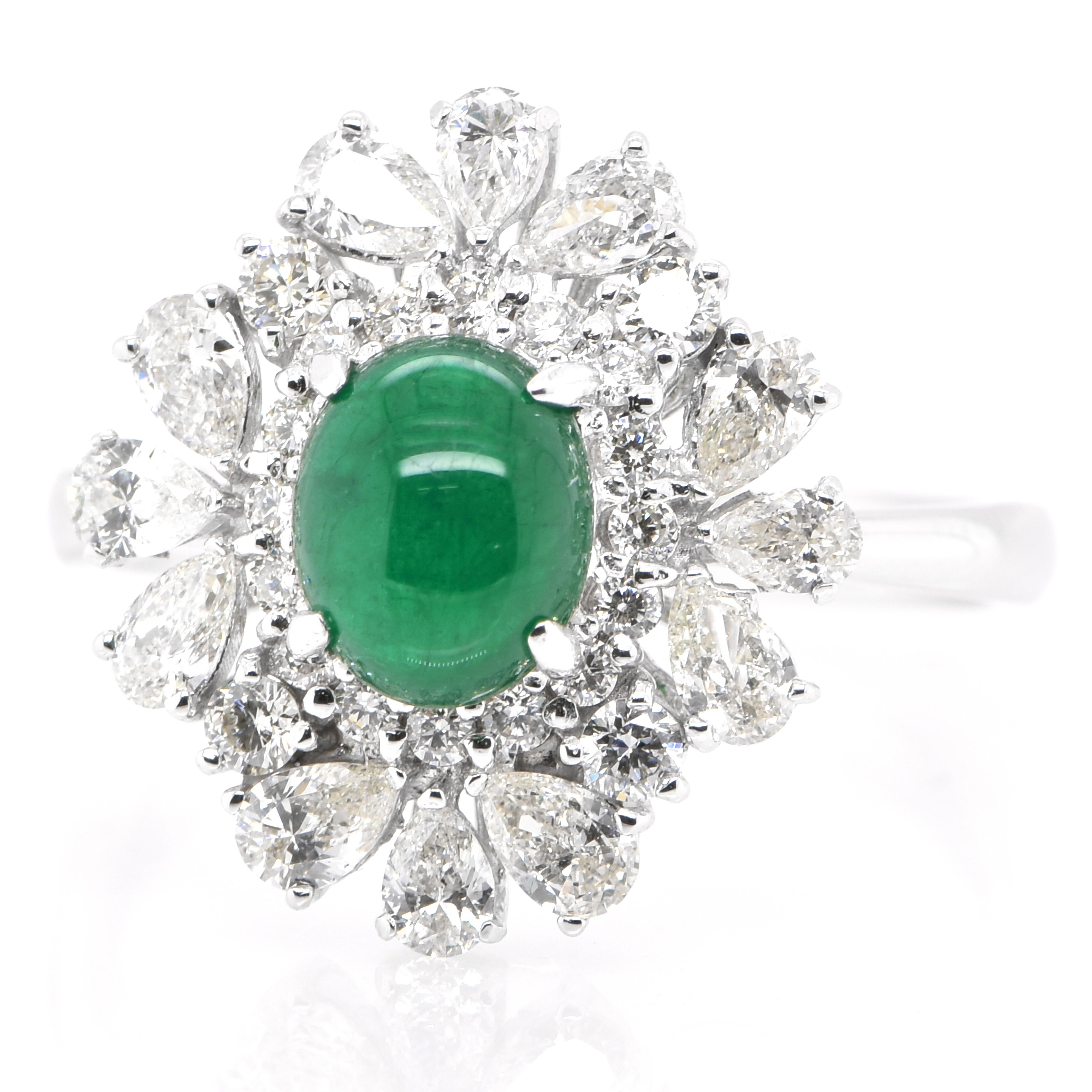 A stunning ring featuring a 1.13 Carat Natural Emerald Cabochon and 1.01 Carats of Diamond Accents set in Platinum. People have admired emerald’s green for thousands of years. Emeralds have always been associated with the lushest landscapes and the