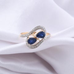 1.13 Carat Pear Blue Sapphire 0.24 Carat SI/H Diamond Ring 14 Karat Yellow Gold
