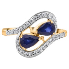 1.13 Carat Pear Blue Sapphire 0.24 Carat SI/H Diamond Ring 14 Karat Yellow Gold