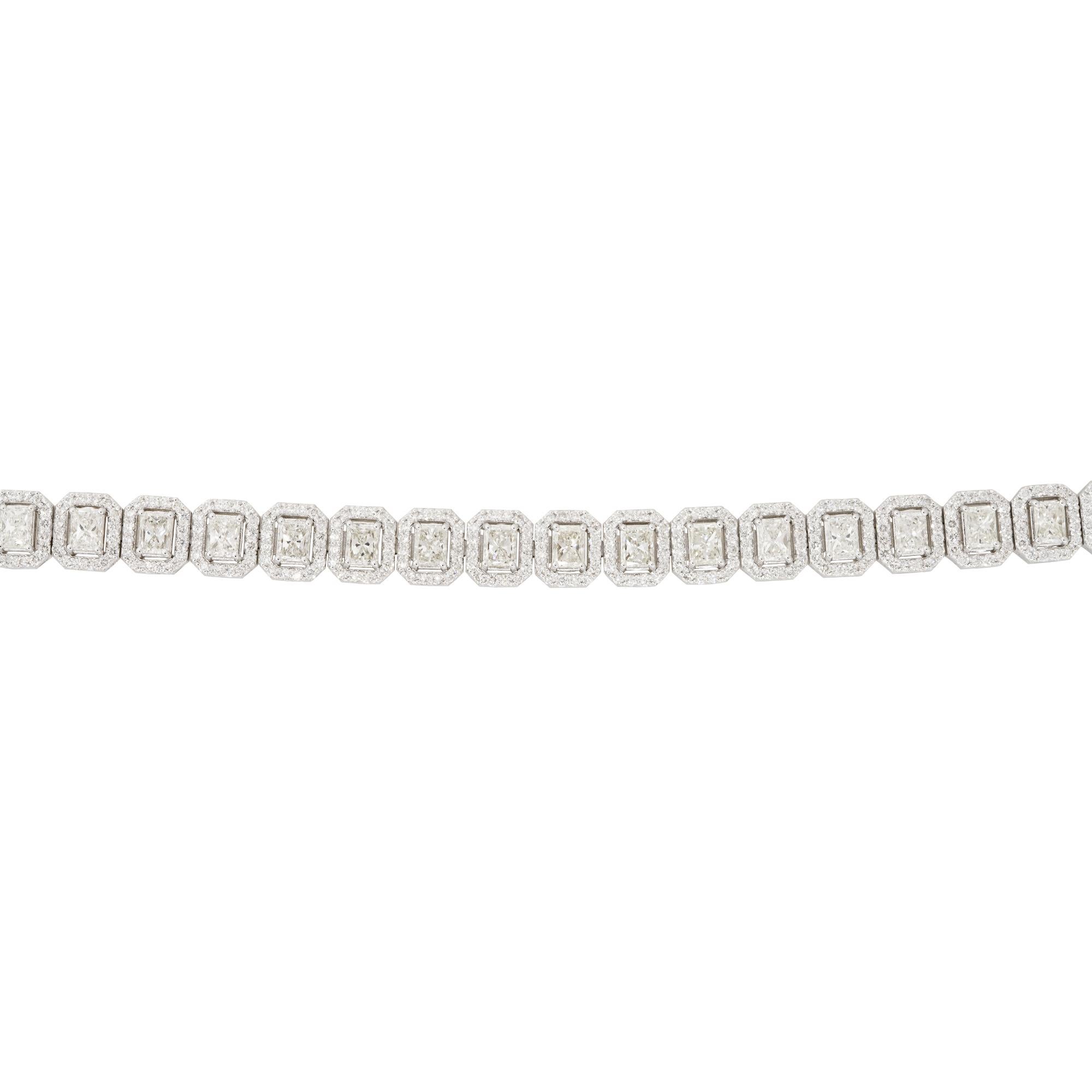 18k White Gold 11.3ctw Radiant Cut Diamond Halo Tennis Bracelet

Material: 18k White Gold
Diamond Details: Approximately 7.46ctw of Radiant Cut Diamonds and approximately 3.84ctw of Round Brilliant Diamonds set in each Halo. Diamonds are