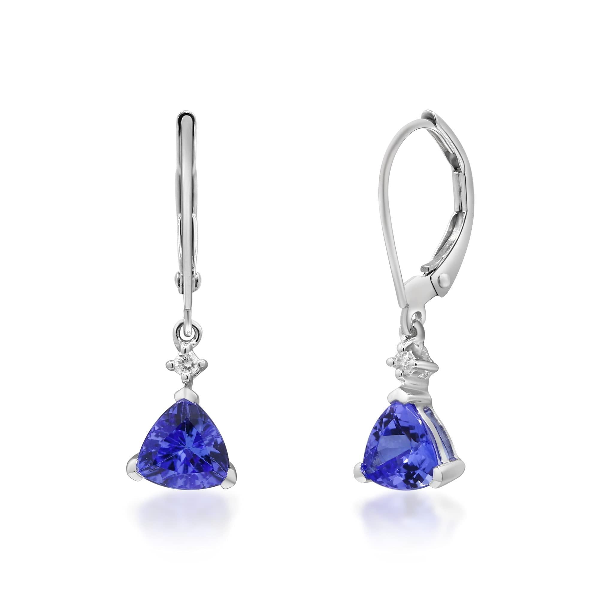 Each of these pretty earrings features a brilliant trillion-cut tanzanite gemstone dangling under a fiery Gin& Grace Natural white diamond accent. A highly polished finish completes the elegant look of these 14-karat white gold earrings. Style: