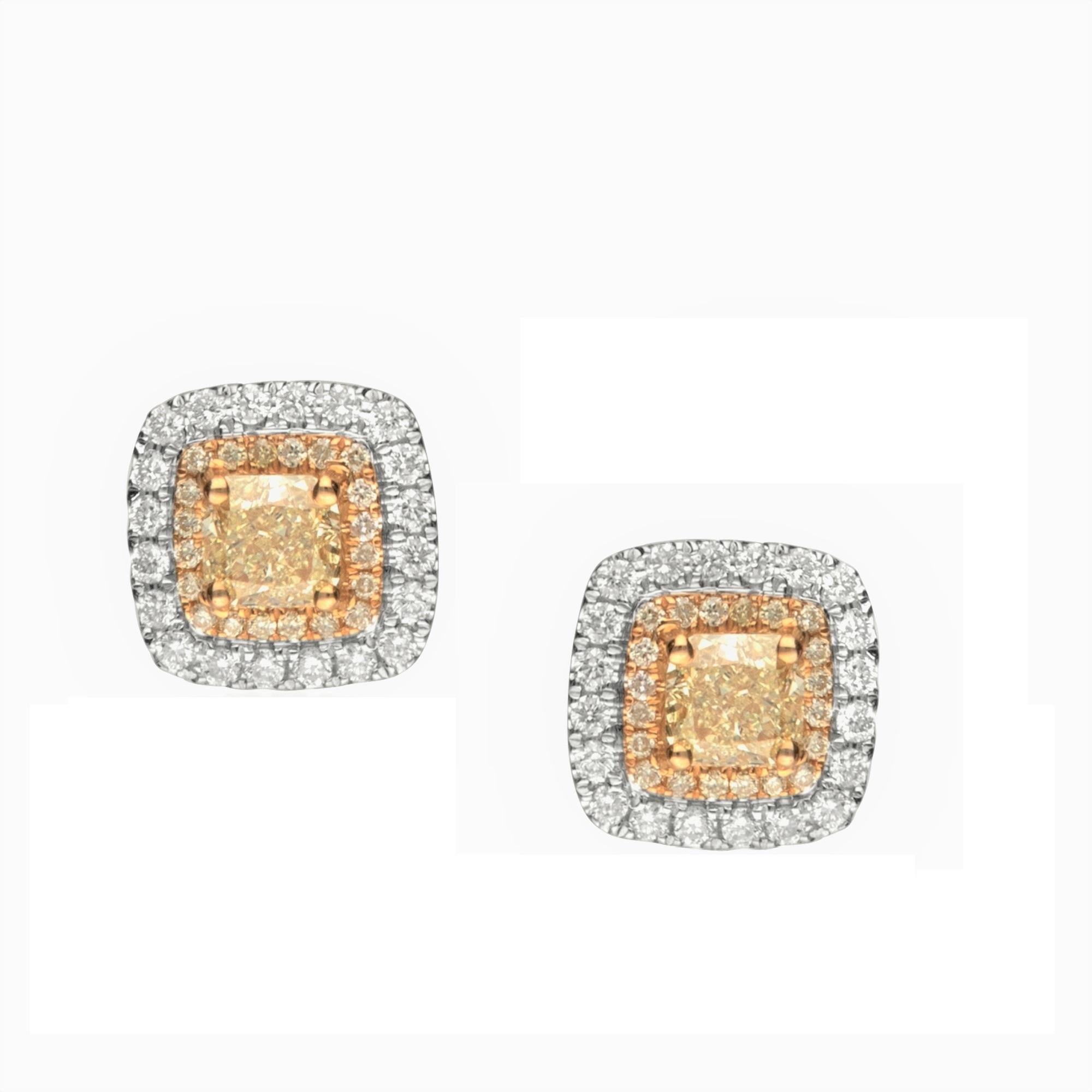 This beautiful pair of 14kt two tone yellow diamond studs by Gin and Grace has center of 2 cushion cut yellow diamonds 1.01 ct. SI quality, surrounded by 40 smaller yellow diamonds 0.13 ct. and 40 round brilliant cut white diamonds 0.30 carat SI