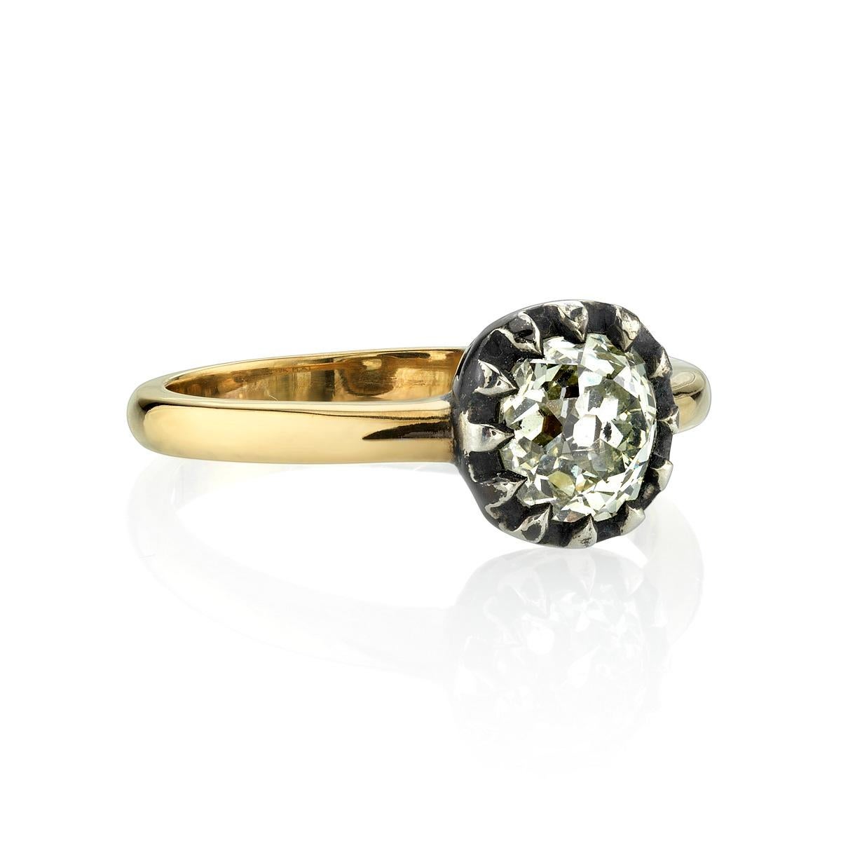 1.13ctw O-P/I1 GIA certified antique old mine cut diamond set in a handcrafted 18k yellow gold and oxidized silver mounting.

