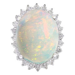 Bague en or blanc massif 14 carats avec opale et diamants