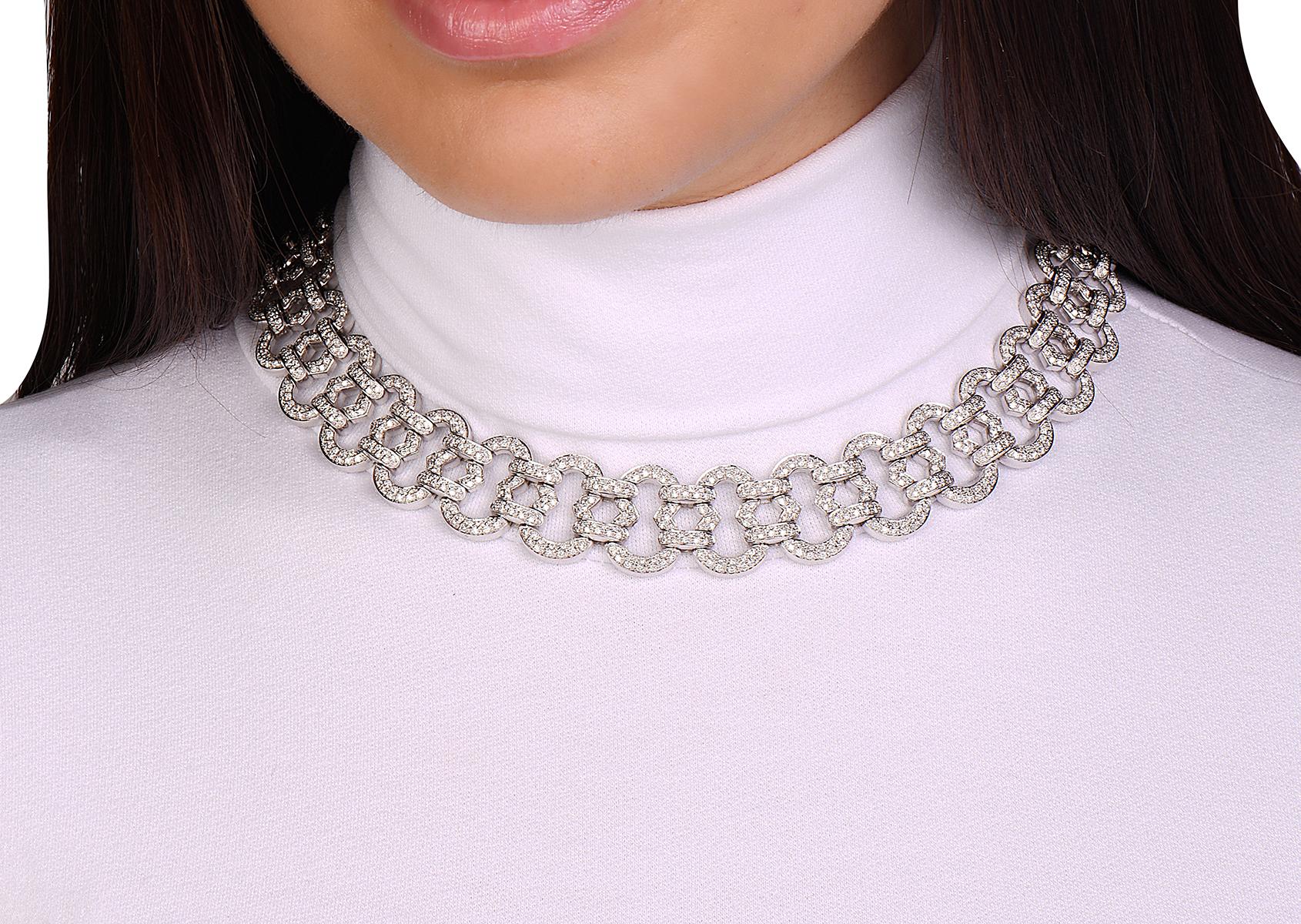This necklace features 11.32 carats of G-H VS diamonds set in 18K white gold. This necklace was made in Italy with the highest quality standards of craftsmanship and is extremely flexible with a comfort fit. 6 3/4 inch length. 155.83 grams total