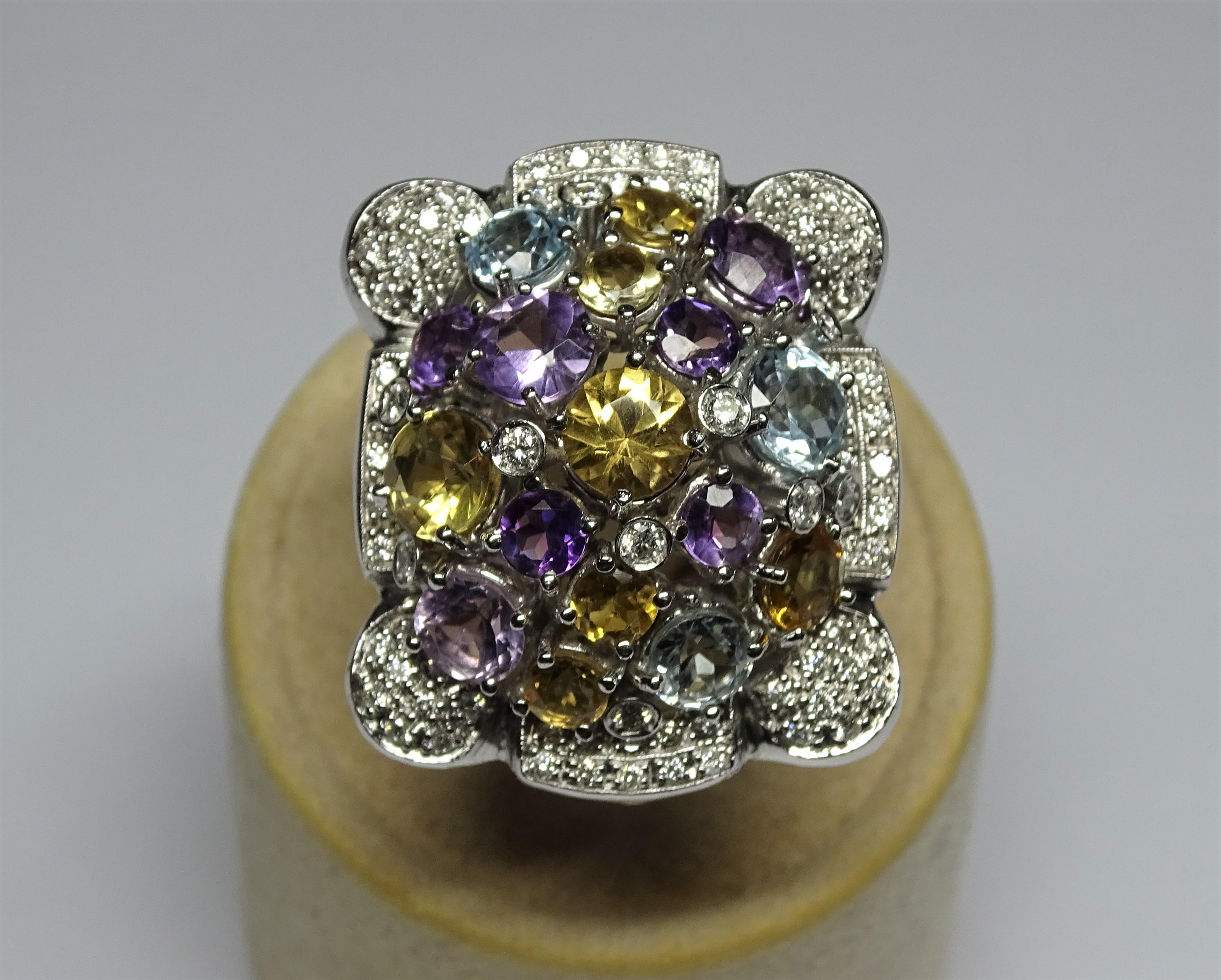 This Ring is made of 18K White Gold.
This Ring has 1.10 Carats of White Diamonds.
This Ring has 11.35 Carats of Citrine, Amethyst and Blue Topaz.
Size ITA: 14.5 - USA: 7
We're a workshop so every piece is handmade, customizable and resizable.