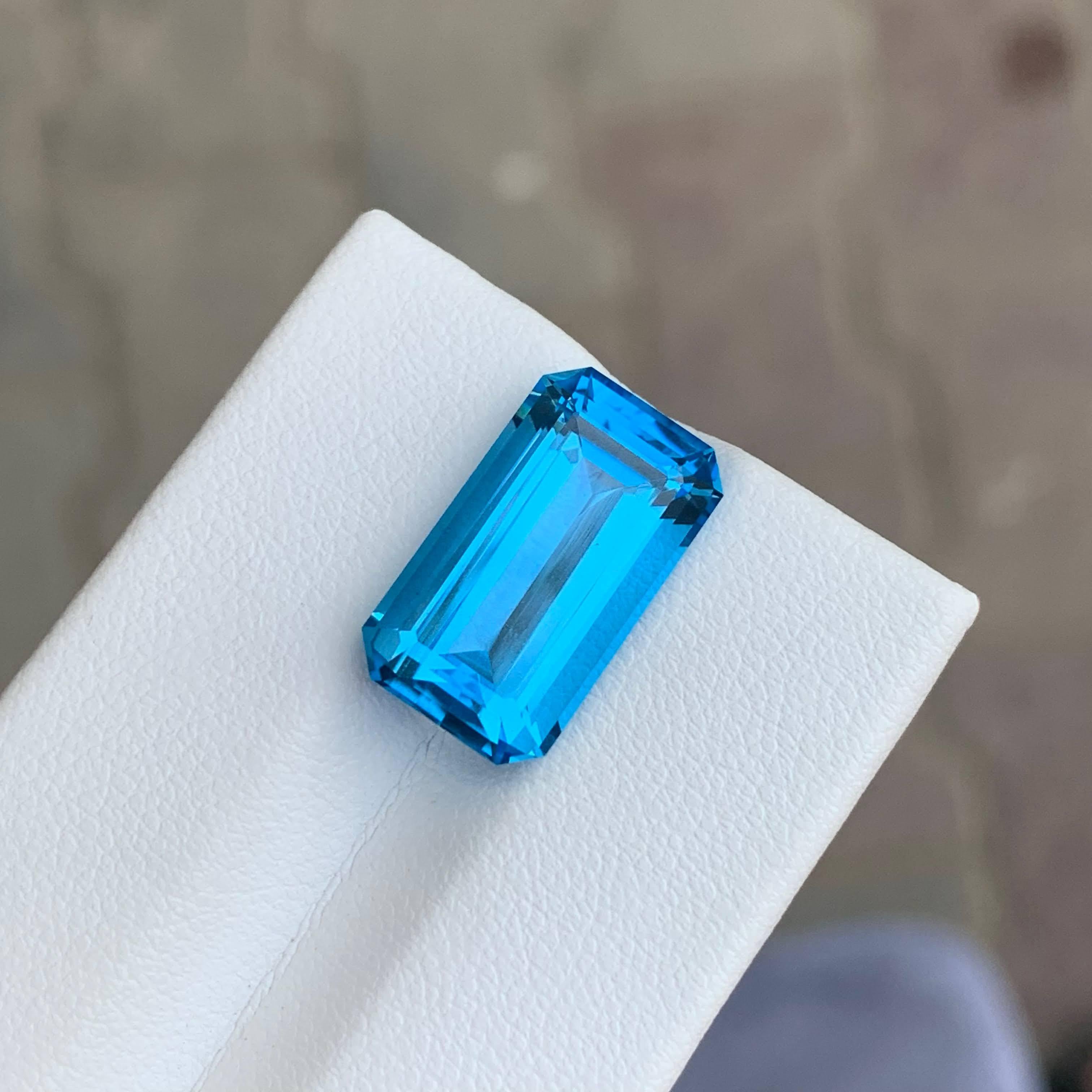 Femenino o masculino 11,35 quilates Topacio azul neón natural suelto talla esmeralda Piedra preciosa de Madagascar en venta