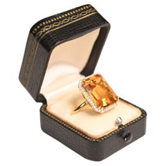Anello aureola con citrino naturale taglio smeraldo (circa 11,30 carati), oro giallo 18 carati