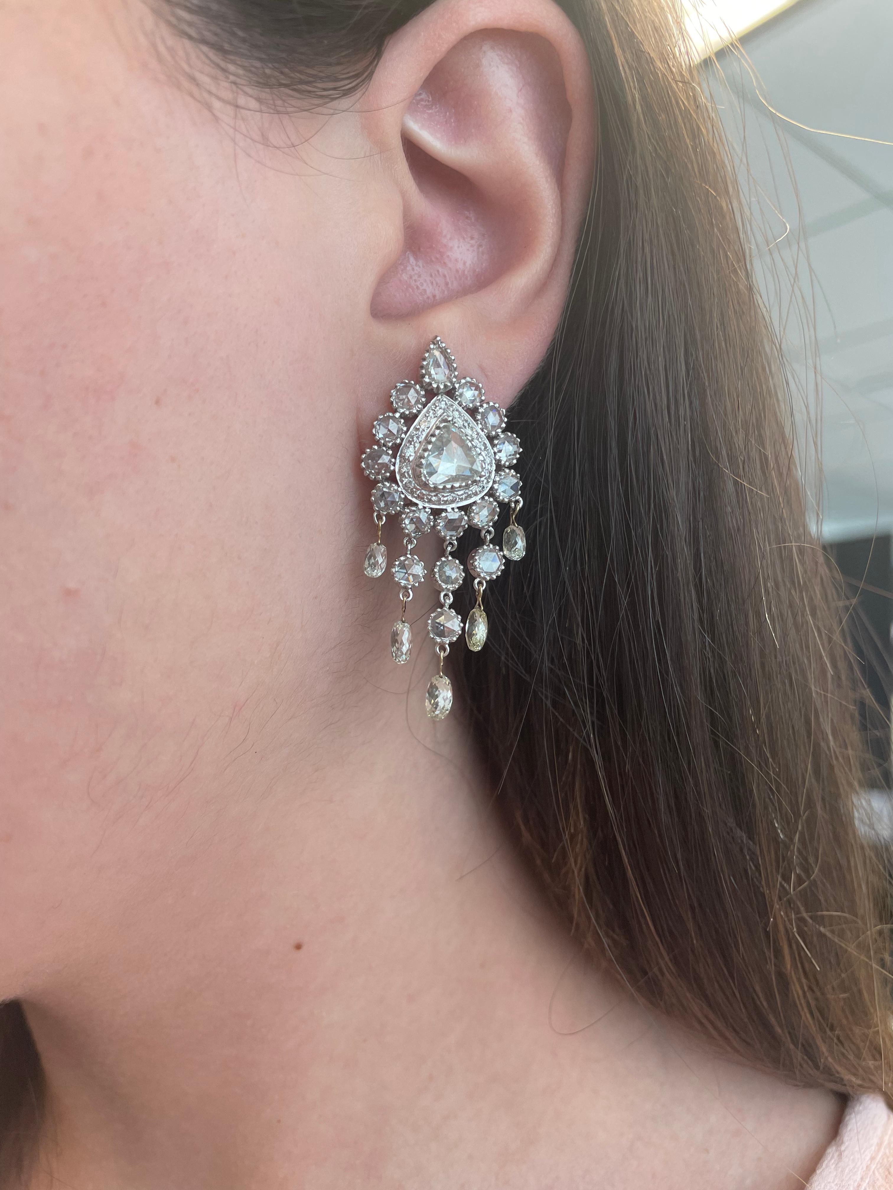 Stunning rose cut diamond chandelier statement earrings.
11.35 carats of rose cut, briolette and round diamonds. Rose cuts and rounds approximately H/I color and VS clarity. Briolette cut diamonds approximately J/K color and VS clarity. 18-karat