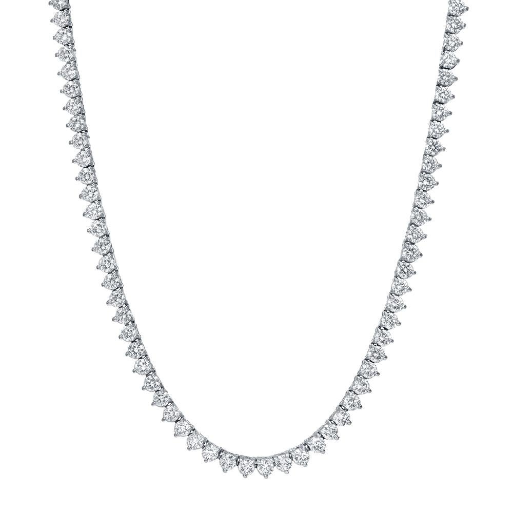 Exquisite diamond tennis chain featuring 11.37 carats of round diamonds hand set in three prong mountings casted in 18 karat white gold. Necklace features natural round brilliant cut diamonds in F color, SI 1 clarity. 

DETAILS: 
- 18k white gold