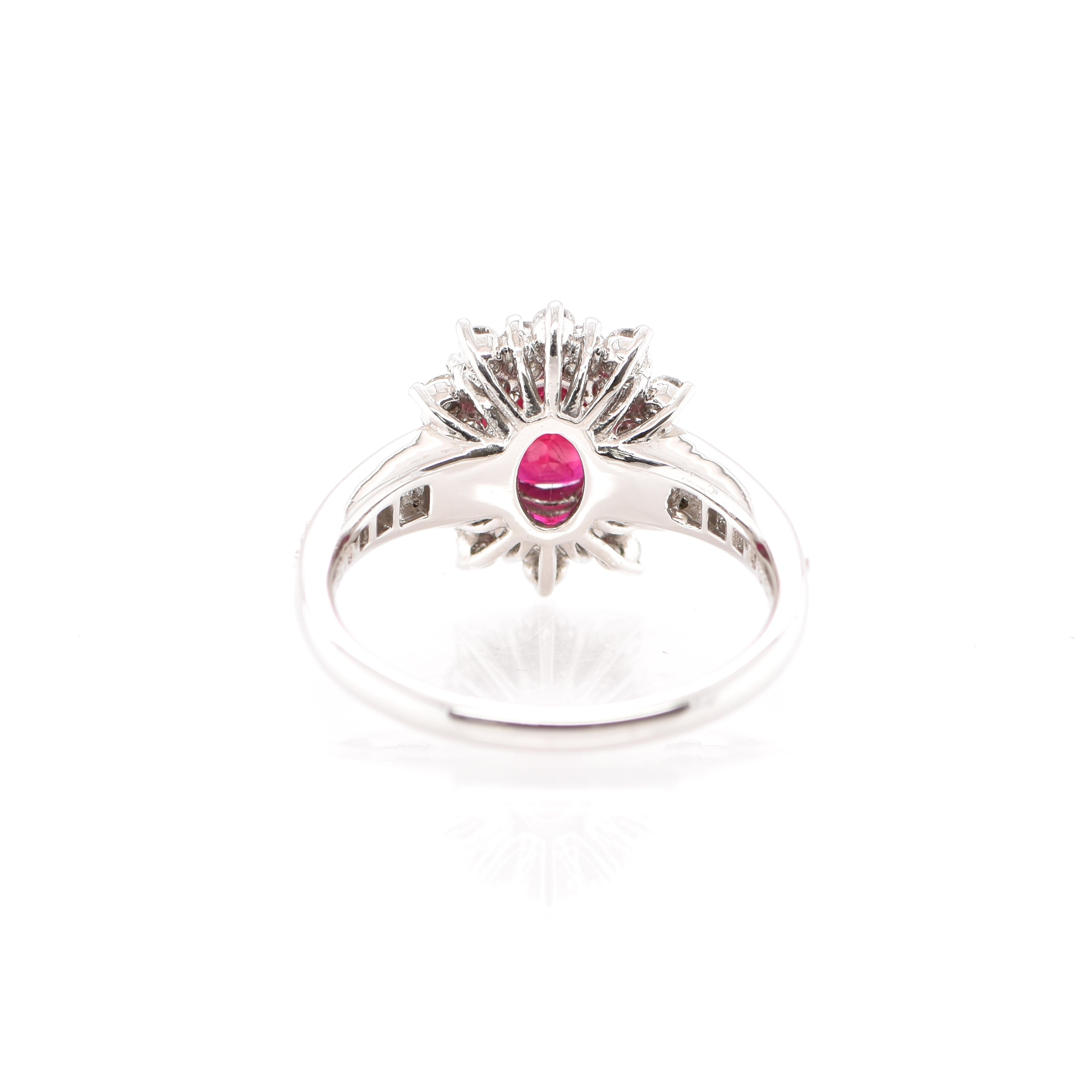 A beautiful Halo Ring featuring a stunning 1.137 Carat Ruby and 0.73 Carats of Diamond Accents set in Platinum. The Ruby exhibits great color and luster. Rubies are referred to as 