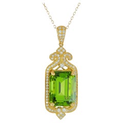 11.37 cts Natural Pakistani Peridot 
0.54 cts Diamonds 18K Yellow Gold Pendant