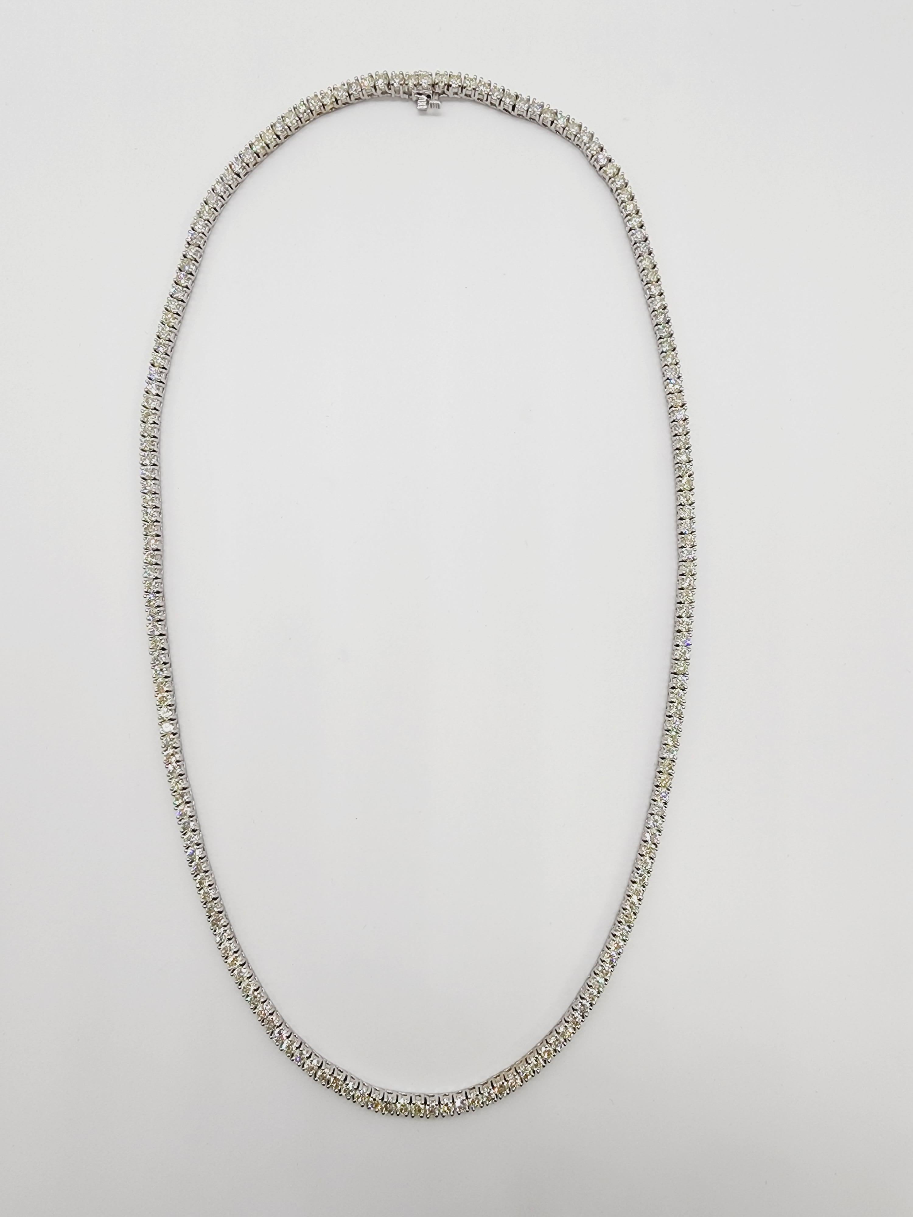 Beautiful quality tennis necklace, round-brilliant cut white diamonds clean and excellent shine!

Carat Weight: 11.38 cts
14k solid white gold
Style: Classic four-prong style for maximum light brilliance. Length: 16 inch 
Average Color: G
Average