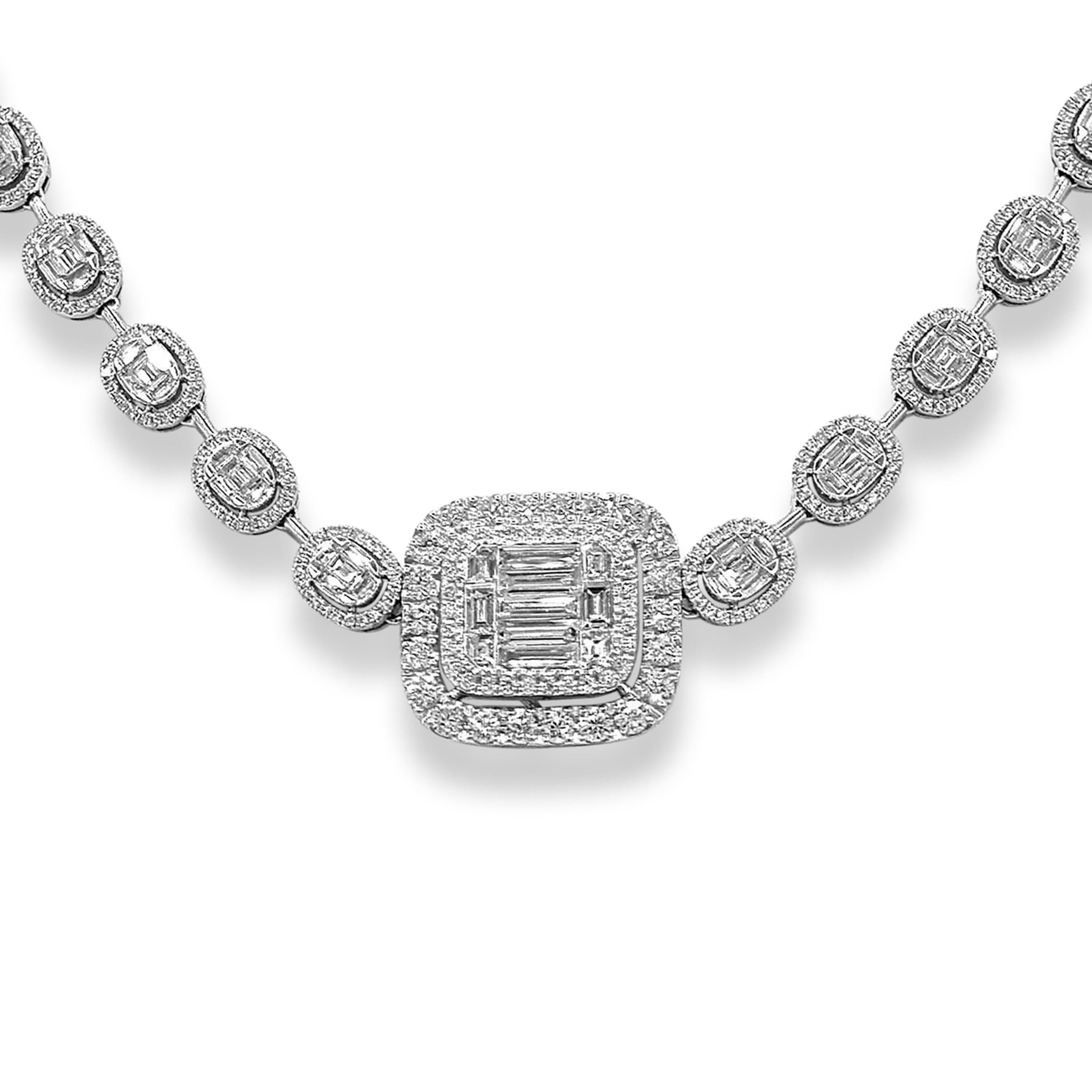 864 White Round Diamonds: 4.07 Carats
195 Baguette Diamonds: 7.32 Carats
Metal: 18K White Gold, 39.02  Grams
