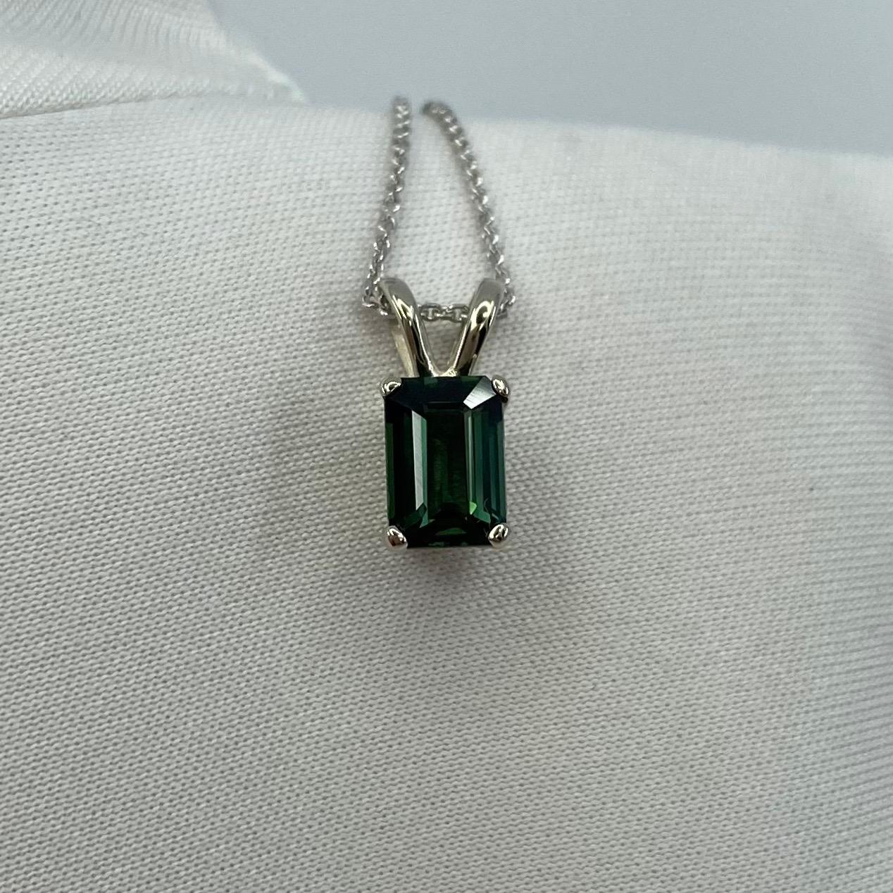 Deep Greenish Blue Thai Sapphire White Gold Solitaire Pendant Necklace.

1.13 Carat Thailand sapphire with a stunning deep greenish blue colour and an excellent emerald cut. Also has excellent clarity, very clean stone.. Set in a fine 14k white gold